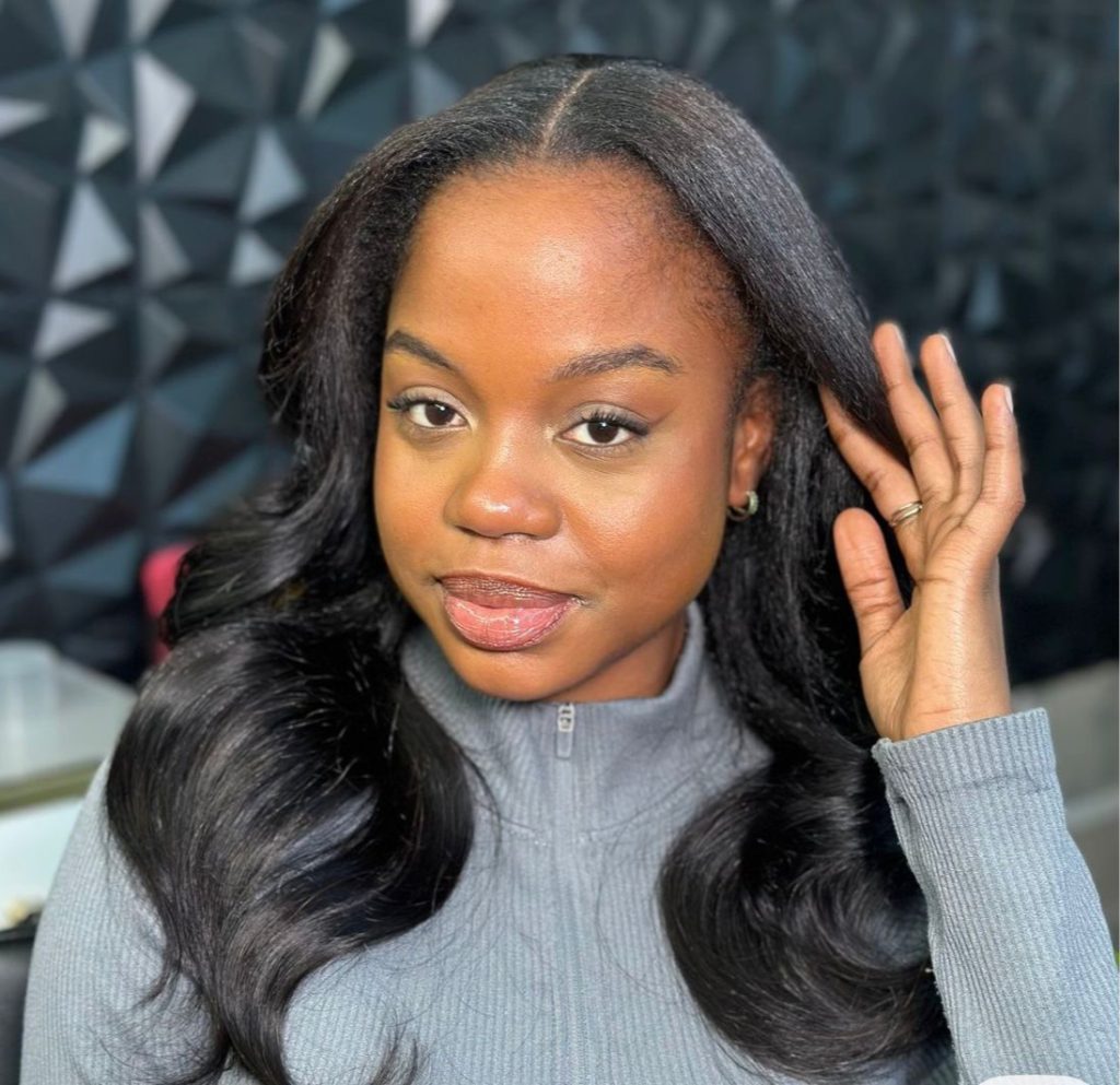 Weave sew-in hairstyle in Ikeja